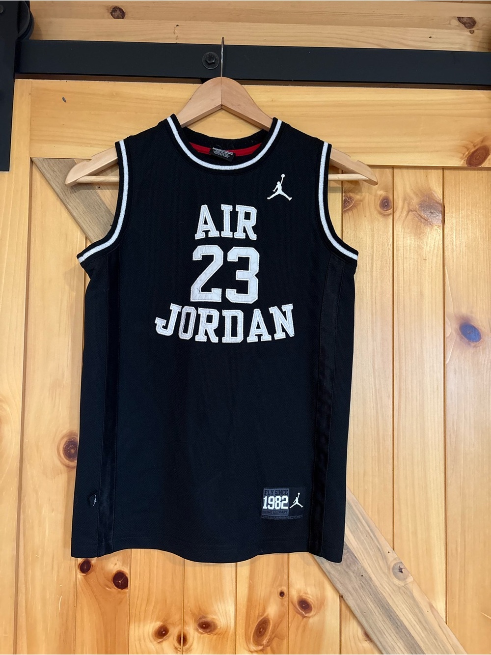 Jordan Black Tank Top with Red Trim and White Jumpman